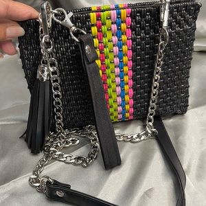 Cross body made out of recycled plastic.